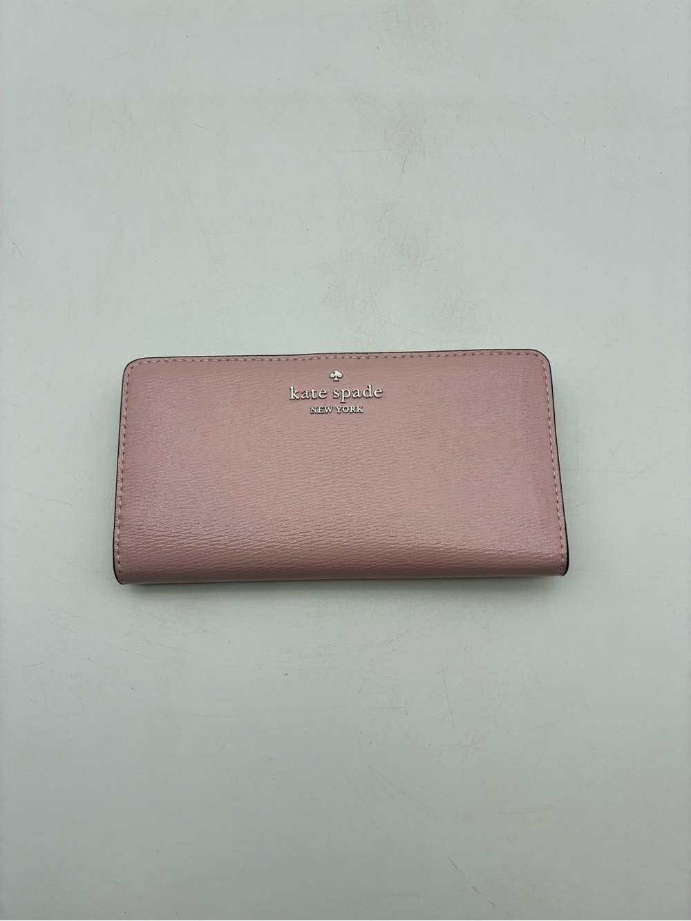 kate spade blush pink zip-around continental wallet